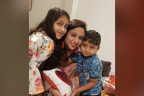 Seema Banu Syed and her two children