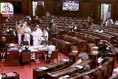 Opposition MPs staging protest in the well of the Rajya Sabha