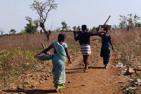 MGNREGA labourers on their way back home after work