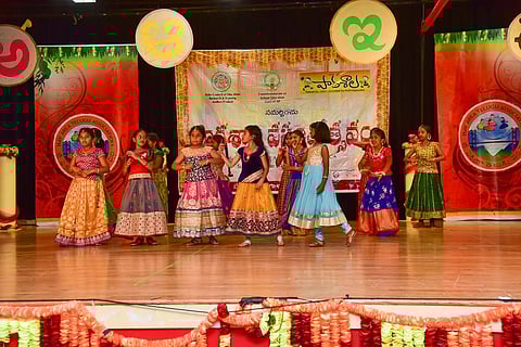 NRI Children dancing on the floor in a cultural show