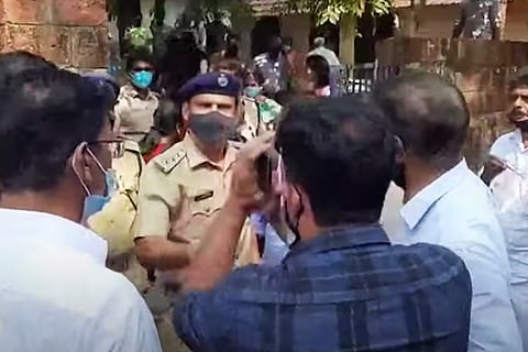 Party workers police clash