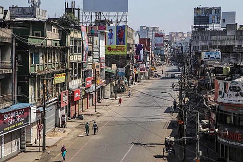 Aerial shot of shuttered shops in a street in Nagpur