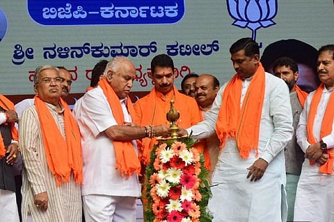 BJP leaders including Govind Karjol, BS Yediyurappa, Nalin Kumar Kateel, Basavaraj Bommai(behind), CT Ravi, Muralidhar Rao(left to right) lighting a lamp