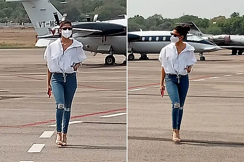 Wearing a white shirt and distressed jeans with her hair tied in a bun, Nayanthara is seen sporting a casual look in the pictures.