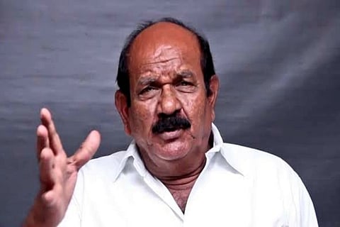 Actor- comedian Nellai Siva is seen in a white shirt in the image.