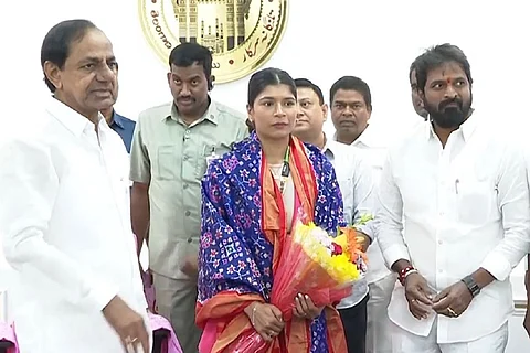 Telangana Chief Minister K. Chandrasekhar Rao and boxer Nikhat Zareen