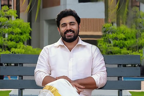Nivin Pauly in mundu and shirt