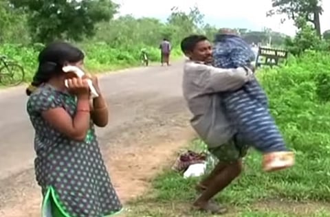 Video: Tribal man carried wife’s body for 12km, as his daughter weeps beside him