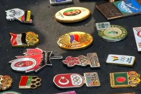 Olympic exotica: Pin collectors add colour and informal social exchange at Games