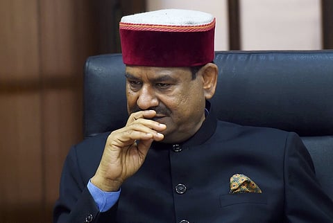 Om Birla sitting with his hand under his chin