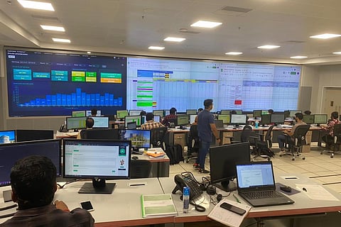 Inside the control room in Ernakulam with screens displaying COVID-19 data in district