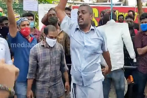 Protest by PSC candidates in ranklist. Group of men can be seen raising slogans