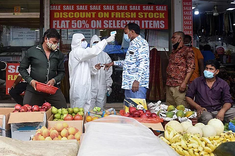 Screening people in market place in Mumbai