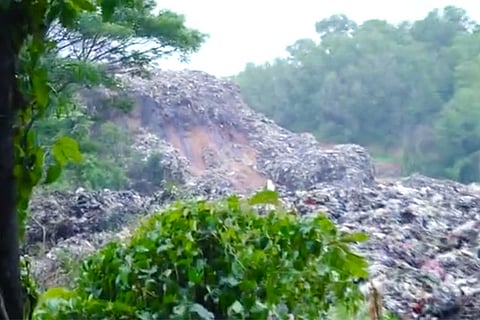 Waste from landfill slides down with rainwater in Mangaluru, enters homes and farms