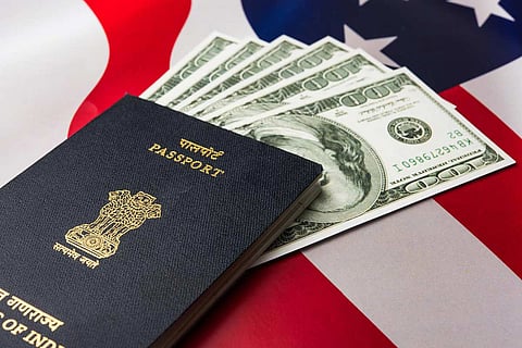 Indian passport with US Dollars