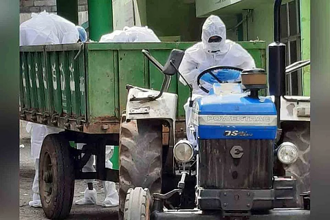 Telangana doctor drives tractor to transport COVID-19 patient’s body after driver refuses