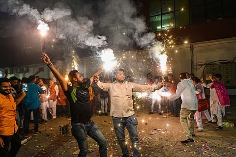 Representative image of people bursting crackers
