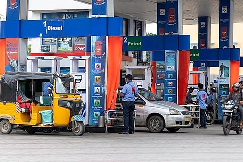 Vehicles being filled up at a petrol bunk