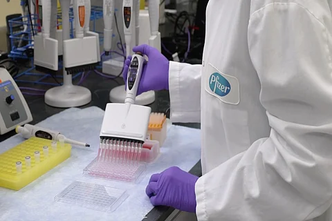 A lab technician doing coronavirus testing