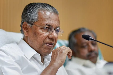Kerala Chief Minister Designate Pinarayi Vijayan facing a mike while speaking at a meeting
