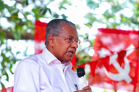 Pinarayi with CPIM flag as background