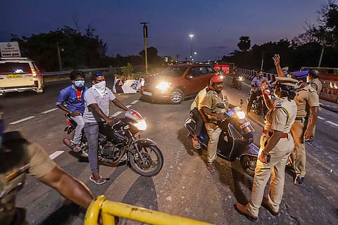 Police stop vehicles on ECR