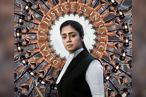 Jyotika in a poster from Ponmagal Vandhal