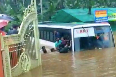 Passengers being rescued from Kerala RTC bus stuck on a flooded road