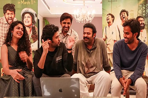 Actor Prabhas watches the trailer of 'Jathi Ratnalu' along with the lead actors and director.
