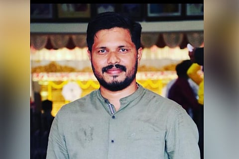 BJP Yuva Morcha member Praveen Nettaru wearing grey shirt