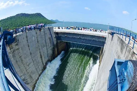 Water gushing out of the gate that was damaged at the Pulichintala reservoir