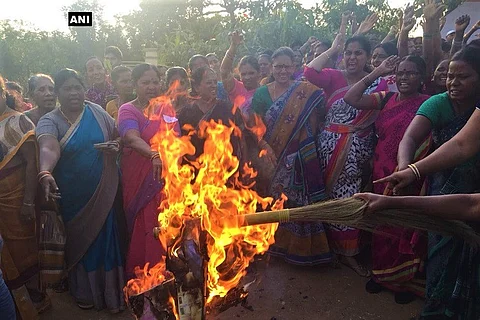 Women protest against RGV's 'God, Sex and Truth' in Vizag, burn effigy