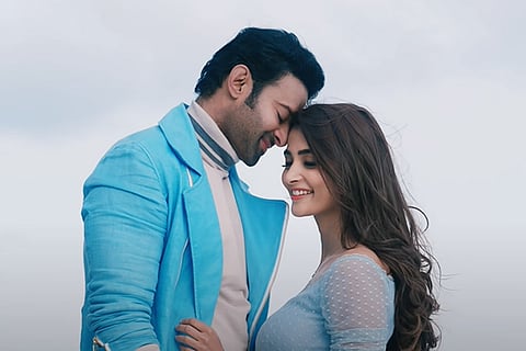 Screengrab from Radhe Shyam trailer featuring Pooja Hegde and Prabhas