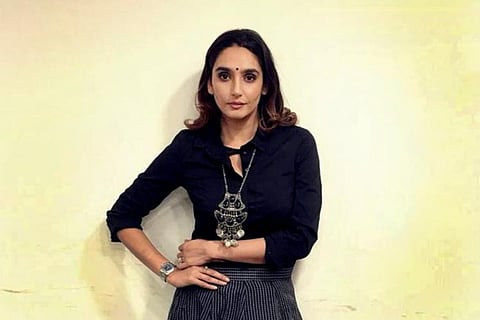 Ragini Dwivedi is seen in an ethnic black costume in the image.