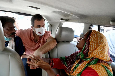Congress leader Rahul Gandhi with the nine-year-old victim's family