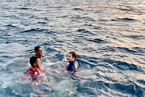 Congress Leader Rahul Gandhi swimming in sea with fishermen in Kollam coast in Kerala