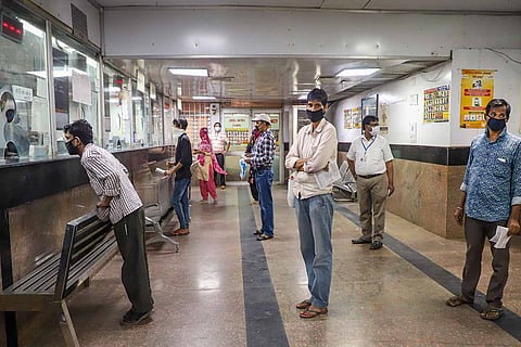 Passengers waiting at railway counters