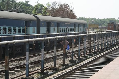 This is exactly what you should not do to get off a train