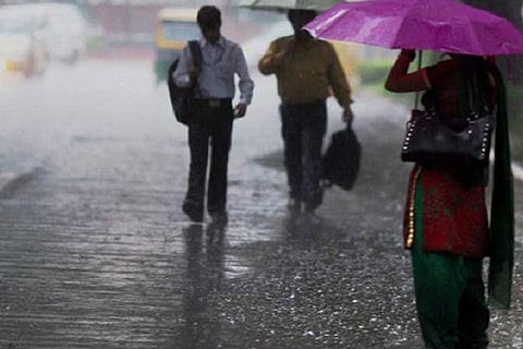 People on street during rain