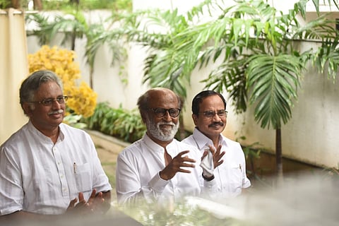 Actor-turned-politician Rajinikanth along with Tamilaruvi Manian and Ra Arjunamurthy