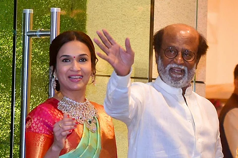 Actor Rajinikanth with daughter, producer and director Soundarya