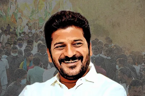 Revanth Reddy smiling and looking away from the camera