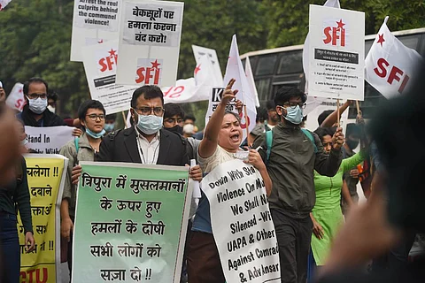 Students' Federation of India activists protest against alleged communal violence in Tripura, at Tripura Bhawan in New Delhi, Friday, Nov. 05, 2021