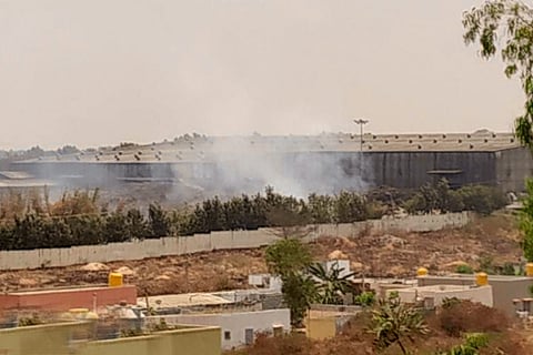 Smoke from the fire at the solid waste management plant in Chikkanagamangala, Bengaluru seen from a distance