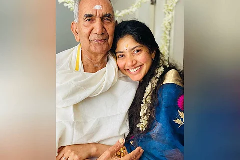 Actor Sai Pallavi with her grandfather