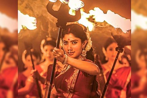 Sai Pallavi holding a fiery trident in poster of Shyam Singha Roy