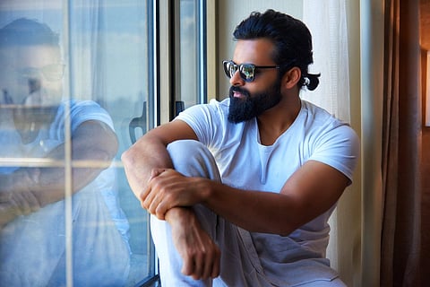 Sai Dharam Tej staring at the window