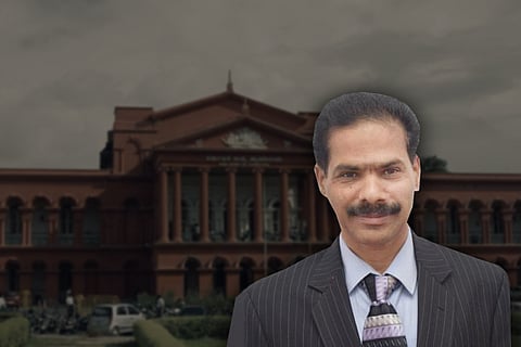 An image of Justice HP Sandhesh against the backdrop of the Karnataka High Court.
