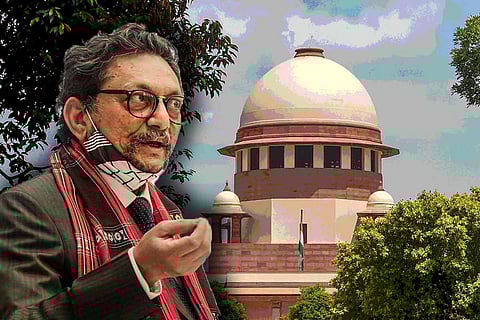 CJI SA Bobde in the foreground with Supreme Court in the background