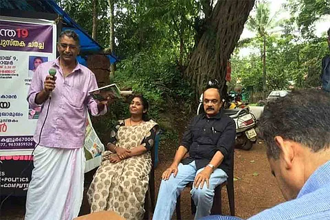 Shukkur Pedayangode with Paul Zakariah speaking at a literary gathering